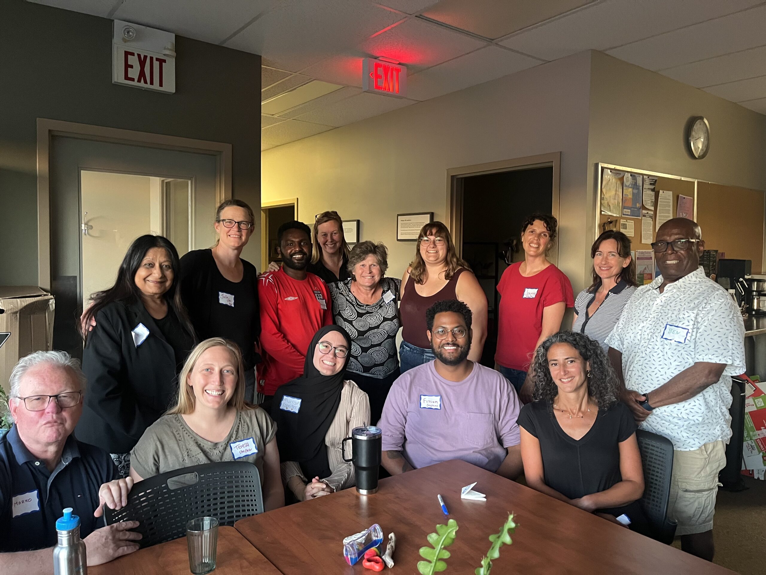 Team members from CJI smile for the camera